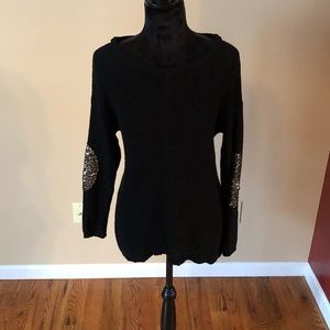 Black Havana sweater with gold sequin elbows